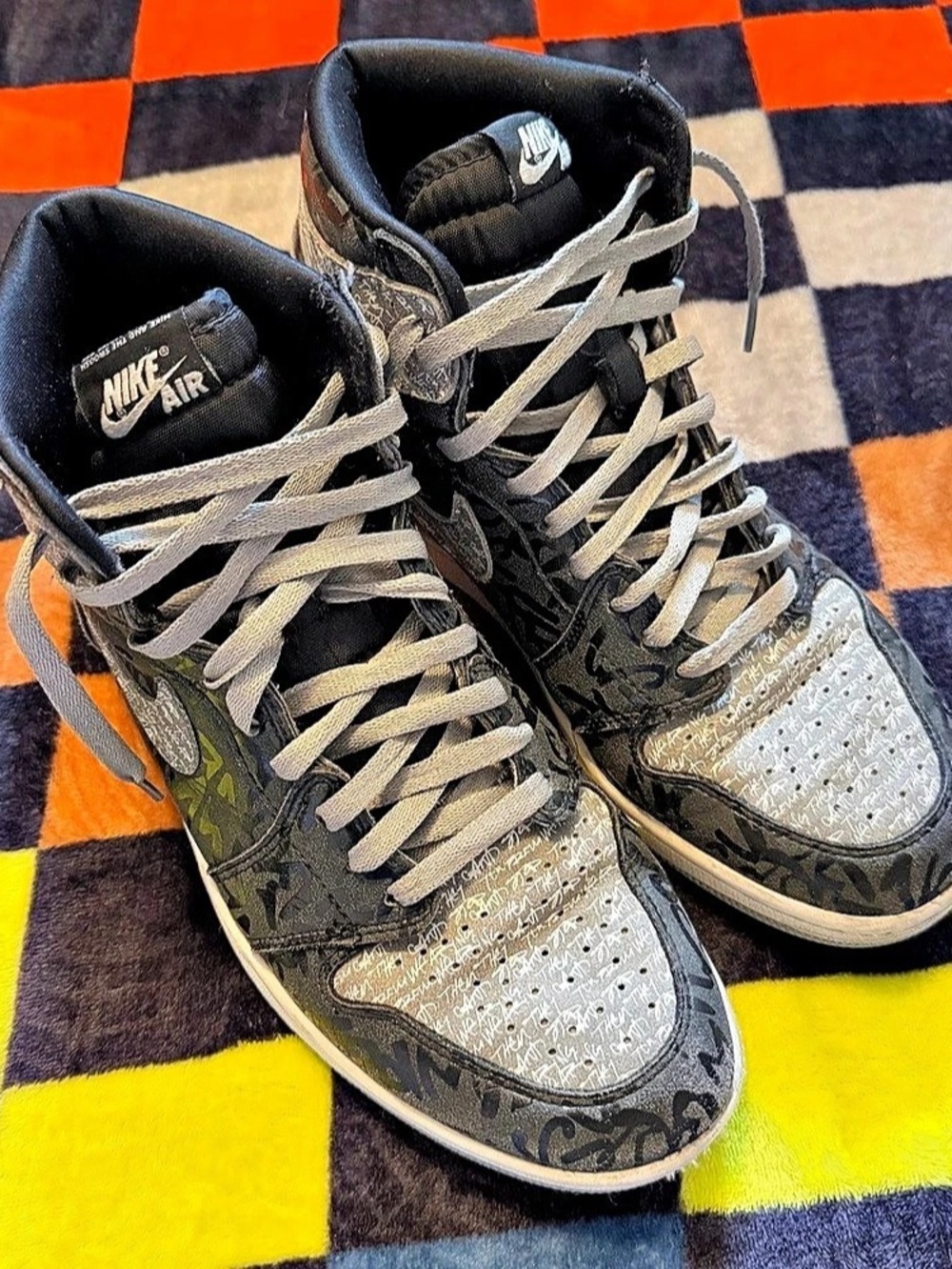 Jordan 1 Rebellionaire High-Top Sneakers in Black & Gray